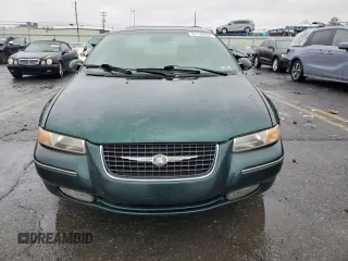 1999 Chrysler Cirrus LXi z VIN 1C3EJ56H2XN637180, wystawiony jako Copart lot #81729684 z przebiegiem 80 115 mil mil oraz Tytuł czysty. Historia ofert i sprzedaży dostępna na DreamBid. Obrazek 5.