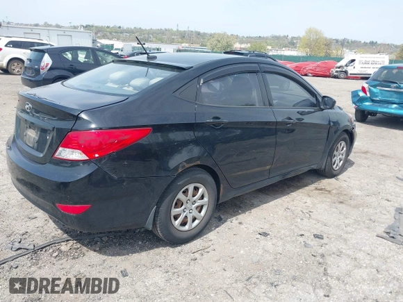2012 Hyundai Accent GLS with VIN KMHCT4AE1CU260048, listed as a IAAI auction lot 42056125 with 168,530 mi miles. Bid and sale history available at carsss.com. Image 4.