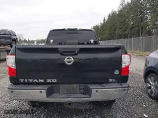 2016 Nissan Titan XD Platinum Reserve with VIN 1N6BA1F2XGN502660, listed as a IAAI auction lot 41731577 with 118,581 mi miles. Bid and sale history available at carsss.com. Image 16.