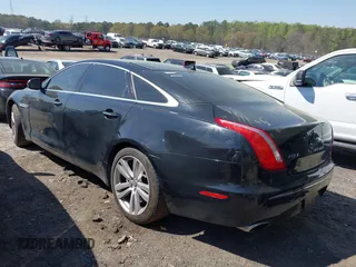 2013 Jaguar XJ Portfolio z VIN SAJWJ2GD0D8V49329, wystawiony jako IAAI lot #41829426 z przebiegiem 125 584 mil mil oraz . Historia ofert i sprzedaży dostępna na DreamBid. Obrazek 3.
