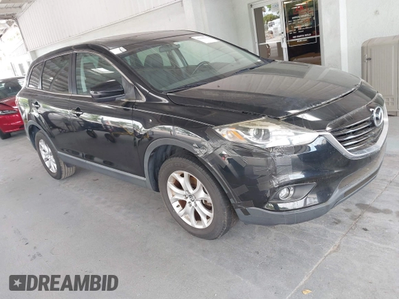 2014 Mazda CX-9 Touring with VIN JM3TB2CA2E0446267, listed as a IAAI auction lot 42196512 with 98,670 mi miles and . Bid and sale history available at carsss.com. Image 1.