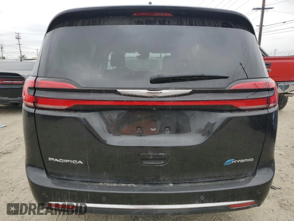 2023 Chrysler Pacifica Hybrid Touring L with VIN 2C4RC1L78PR541746, listed as a Copart auction lot 54633865 with 5,291 mi miles and Non repairable. Bid and sale history available at DreamBid. Image 6.