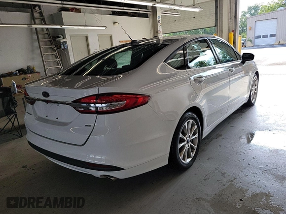 2017 Ford Fusion SE z VIN 3FA6P0H76HR151451, wystawiony jako IAAI lot #42787592 z przebiegiem 90 386 mil mil oraz . Historia ofert i sprzedaży dostępna na DreamBid. Obrazek 16.