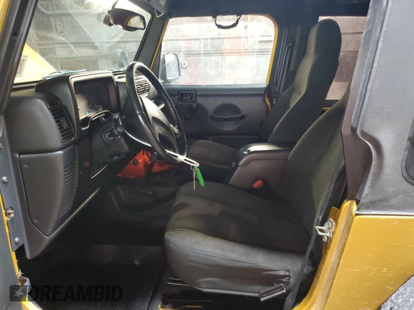 2003 Jeep Wrangler Rubicon with VIN 1J4FA69S23P322353, listed as a Copart auction lot 43915745 with 117,769 mi miles and Salvage title. Bid and sale history available at DreamBid. Image 7.