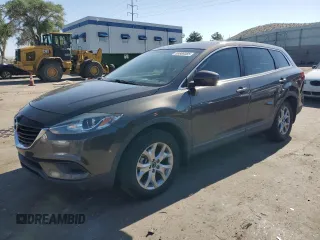 2015 Mazda CX-9 Sport z VIN JM3TB2BA8F0468258, wystawiony jako Copart lot #59869385 z przebiegiem 83 076 mil mil oraz Szkoda całkowita • Salvage title. Historia ofert i sprzedaży dostępna na DreamBid. Obrazek 1.