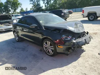 2012 Volkswagen Eos Lux with VIN WVWFW7AH7CV016872, listed as a Copart auction lot 52591415 with 121,130 mi miles and Salvage Title. Bid and sale history available at DreamBid. Image 4.