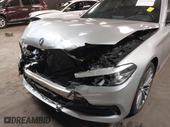 2018 BMW 5 Series 540i xDrive with VIN WBAJE7C53JWD52669, listed as a IAAI auction lot 41634800 with 89,829 mi miles and . Bid and sale history available at DreamBid. Image 6.