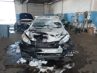 2009 Toyota Matrix S with VIN 2T1LE40E39C004676, listed as a IAAI auction lot 41366470 with 146,316 mi miles. Bid and sale history available at carsss.com. Image 12.