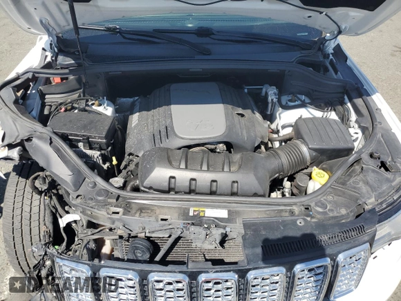 2017 Jeep Grand Cherokee Overland with VIN 1C4RJFCT5HC777748, listed as a Copart auction lot 63121635 with 106,991 mi miles and Salvage title. Bid and sale history available at DreamBid. Image 12.