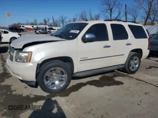 2009 Chevrolet Tahoe LTZ with VIN 1GNFK330X9R304244, listed as a Copart auction lot 42711945 with 263,157 mi miles and Salvage title. Bid and sale history available at DreamBid. Image 1.