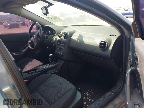 2009 Pontiac G6 1SB with VIN 1G2ZJ57K594261692, listed as a IAAI auction lot 42802373 with 200,469 mi miles and . Bid and sale history available at DreamBid. Image 5.