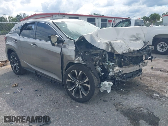 2019 Lexus RX with VIN 2T2ZZMCA1KC131631, listed as a IAAI auction lot 41692742 with 90,161 mi miles. Bid and sale history available at carsss.com. Image 1.