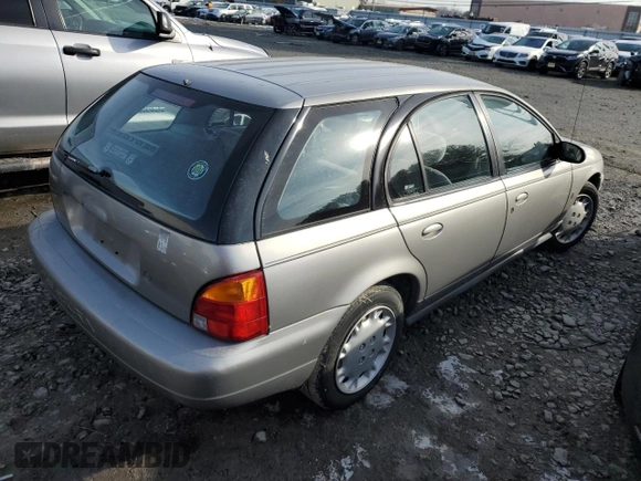 1997 Saturn SW z VIN 1G8ZK8276VZ397575, wystawiony jako Copart lot #86637614 z przebiegiem 119 683 mil mil oraz Szkoda całkowita • Salvage title. Historia ofert i sprzedaży dostępna na DreamBid. Obrazek 3.