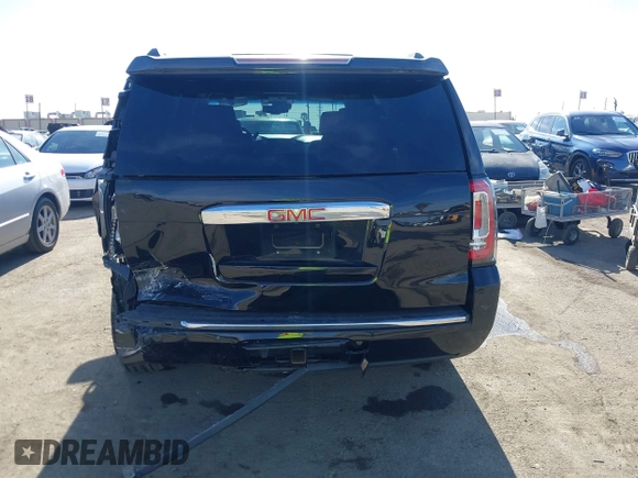 2019 GMC Yukon Denali with VIN 1GKS2CKJ4KR191886, listed as a IAAI auction lot 41198227 with 74,325 mi miles. Bid and sale history available at carsss.com. Image 16.