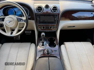 2017 Bentley Bentayga W12 z VIN SJAAC2ZV1HC014037, wystawiony jako Copart lot #54799655 z przebiegiem 36 099 mil mil oraz Szkody całkowita. Historia ofert i sprzedaży dostępna na DreamBid. Obrazek 8.