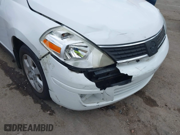 2008 Nissan Versa 1.8 S with VIN 3N1BC13E18L354964, listed as a IAAI auction lot 41581663 with 134,321 mi miles. Bid and sale history available at carsss.com. Image 6.