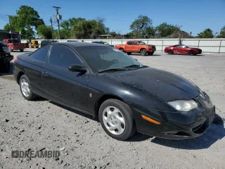 2001 Saturn SC with VIN 1G8ZR12701Z223174, listed as a Copart auction lot 52033445 with 234,079 mi miles and Salvage Title. Bid and sale history available at carsss.com. Image 4.