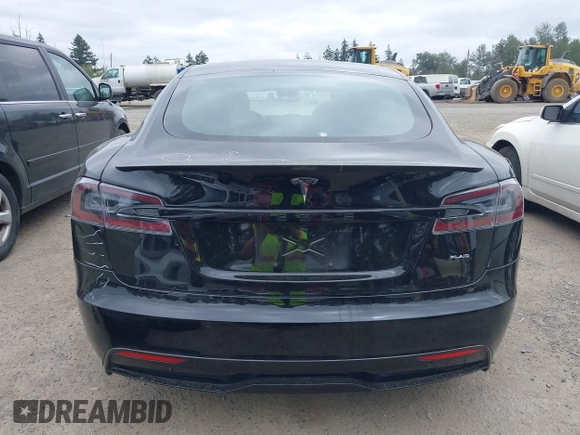 2021 Tesla Model S Plaid with VIN 5YJSA1E62MF447509, listed as a IAAI auction lot 42509281 with 32,372 mi miles and . Bid and sale history available at DreamBid. Image 17.