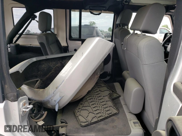 2007 Jeep Wrangler Unlimited Sahara с VIN 1J4GA591X7L158014, выставлен на аукционе Copart как лот 55201105 с пробегом 162 797 миль миль и Списание • Salvage title. История ставок и продаж доступна на DreamBid. Изображение 10.