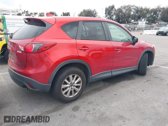 2016 Mazda CX-5 Touring with VIN JM3KE2CY3G0877185, listed as a IAAI auction lot 41729243 with 144,656 mi miles. Bid and sale history available at carsss.com. Image 4.