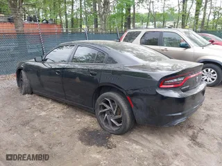 2016 Dodge Charger SXT with VIN 2C3CDXHG6GH332854, listed as a IAAI auction lot 42094761 with 114,883 mi miles. Bid and sale history available at carsss.com. Image 3.