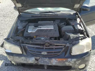 2004 Kia Spectra LX with VIN KNAFE121X45021922, listed as a Copart auction lot 49989845 with 184,189 mi miles and Salvage Title. Bid and sale history available at carsss.com. Image 13.
