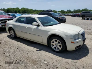 2006 Chrysler 300 Touring with VIN 2C3KA53G26H407435, listed as a Copart auction lot 57140474 with 241,988 mi miles and Clean Title. Bid and sale history available at carsss.com. Image 4.