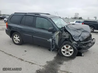 2004 GMC Envoy SLE with VIN 1GKDS13S942432115, listed as a Copart auction lot 43817125 with 147,228 mi miles and Salvage Title. Bid and sale history available at carsss.com. Image 4.