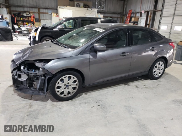 2012 Ford Focus SE z VIN 1FAHP3F28CL444261, wystawiony jako Copart lot #61174145 z przebiegiem 77 612 mil mil oraz Szkoda całkowita • Salvage title. Historia ofert i sprzedaży dostępna na DreamBid. Obrazek 1.