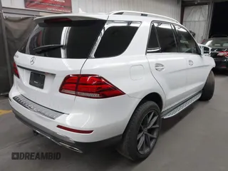 2017 Mercedes-Benz GLE 350 with VIN 4JGDA5JB8HA866073, listed as a IAAI auction lot 42394019 with 159,034 mi miles and . Bid and sale history available at DreamBid. Image 4.