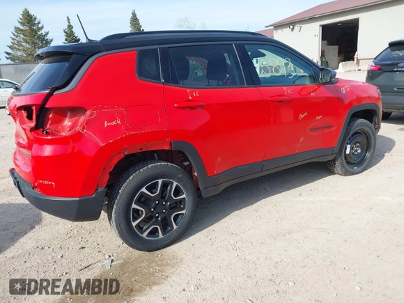 2020 Jeep Compass Trailhawk with VIN 3C4NJDDB2LT142394, listed as a IAAI auction lot 42055893 with 54,490 mi miles and . Bid and sale history available at carsss.com. Image 4.