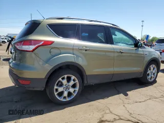 2013 Ford Escape SEL z VIN 1FMCU9H93DUD67848, wystawiony jako Copart lot #57221755 z przebiegiem 129 671 mil mil oraz Czysty tytuł • Clean title. Historia ofert i sprzedaży dostępna na DreamBid. Obrazek 3.