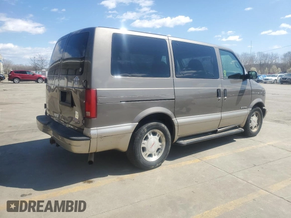 2003 GMC Safari z VIN 1GKDM19XX3B514754, wystawiony jako Copart lot #50744805 z przebiegiem 142 216 mil mil oraz Szkoda całkowita • Salvage title. Historia ofert i sprzedaży dostępna na DreamBid. Obrazek 3.