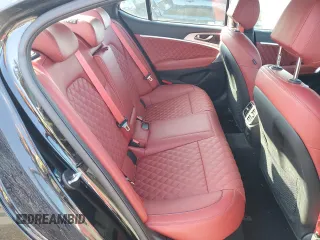 2023 Genesis G70 3.3T with VIN KMTG54TE4PU122153, listed as a Copart auction lot 50794015 with 13,604 mi miles and Salvage title. Bid and sale history available at DreamBid. Image 10.