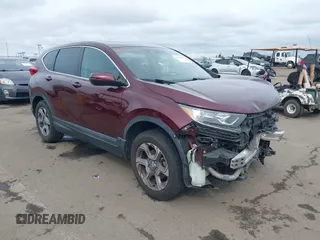 2019 Honda CR-V EX with VIN 7FARW2H56KE053022, listed as a IAAI auction lot 41848570 with 128,676 mi miles. Bid and sale history available at carsss.com. Image 1.