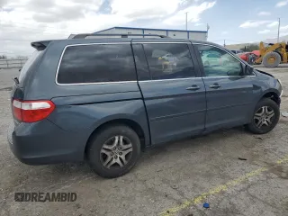 2005 Honda Odyssey EX-L with VIN 5FNRL38645B049087, listed as a Copart auction lot 56891275 with 194,587 mi miles and Salvage title. Bid and sale history available at DreamBid. Image 3.