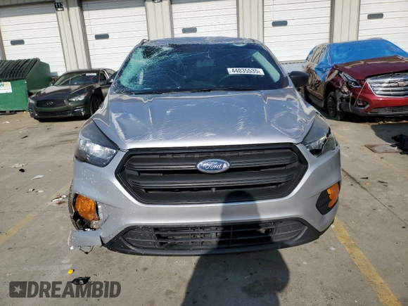 2018 Ford Escape S with VIN 1FMCU0F7XJUA08358, listed as a Copart auction lot 44035535 with 198,467 mi miles and Salvage title. Bid and sale history available at DreamBid. Image 5.