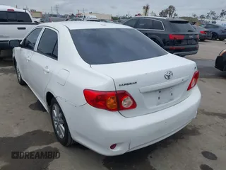 2010 Toyota Corolla with VIN 2T1BU4EE0AC359882, listed as a IAAI auction lot 42051633 with 227,481 mi miles. Bid and sale history available at carsss.com. Image 3.