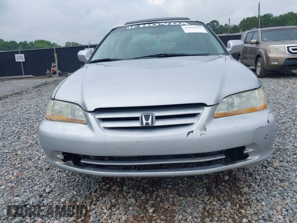 2002 Honda Accord EX z VIN 1HGCG16562A084499, wystawiony jako IAAI lot #42446830 z przebiegiem 241 615 mil mil oraz . Historia ofert i sprzedaży dostępna na DreamBid. Obrazek 6.