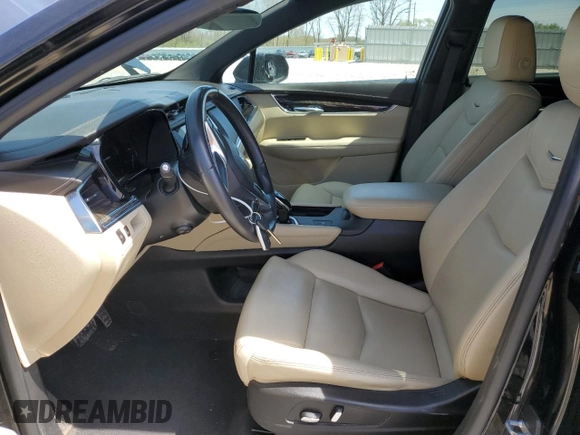 2017 Cadillac XT5 FWD with VIN 1GYKNARS2HZ131243, listed as a Copart auction lot 54189395 with 134,324 mi miles and Salvage Title. Bid and sale history available at DreamBid. Image 7.