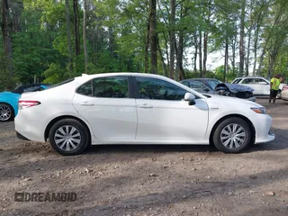 2019 Toyota Camry Hybrid LE z VIN 4T1B31HK4KU005351, wystawiony jako IAAI lot #42162802 z przebiegiem 89 187 mil mil oraz . Historia ofert i sprzedaży dostępna na DreamBid. Obrazek 13.