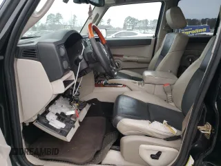 2007 Jeep Commander Overland with VIN 1J8HG68247C557731, listed as a Copart auction lot 87964795 with 174,195 mi miles and Salvage title. Bid and sale history available at DreamBid. Image 7.