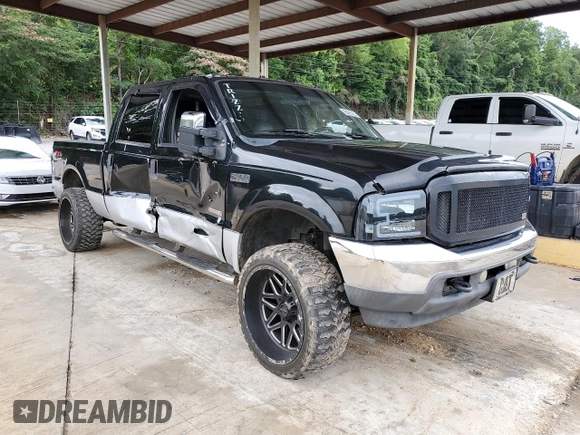2004 Ford F-250 XL with VIN 1FTNW21P94EC60823, listed as a Copart auction lot 59985235 with 271,459 mi miles and Salvage title. Bid and sale history available at DreamBid. Image 4.