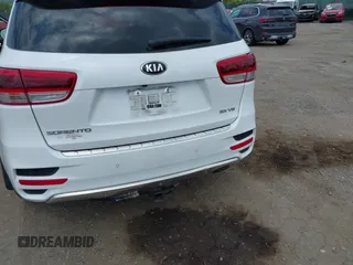 2018 Kia Sorento SX Limited with VIN 5XYPKDA55JG429852, listed as a IAAI auction lot 42823592 with 84,317 mi miles and . Bid and sale history available at DreamBid. Image 12.