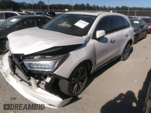 2018 Acura MDX w/Technology Pkg with VIN 5J8YD4H57JL016650, listed as a IAAI auction lot 40979704 with 82,980 mi miles. Bid and sale history available at carsss.com. Image 2.