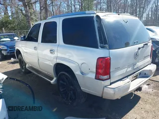 2005 Cadillac Escalade z VIN 1GYEK63N45R152595, wystawiony jako IAAI lot #41823123 z przebiegiem 163 157 mil mil oraz . Historia ofert i sprzedaży dostępna na DreamBid. Obrazek 3.