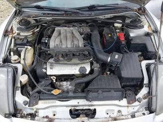 2000 Mitsubishi Eclipse GT with VIN 4A3AC54L3YE151312, listed as a IAAI auction lot 41724925 with 143,793 mi miles. Bid and sale history available at carsss.com. Image 10.