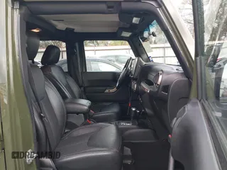 2016 Jeep Wrangler Unlimited Sahara with VIN 1C4BJWEGXGL249638, listed as a IAAI auction lot 41090024 with 98,345 mi miles and . Bid and sale history available at DreamBid. Image 5.