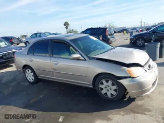 2002 Honda Civic EX with VIN 2HGES26812H602530, listed as a IAAI auction lot 41616488 with 297,137 mi miles. Bid and sale history available at carsss.com. Image 13.