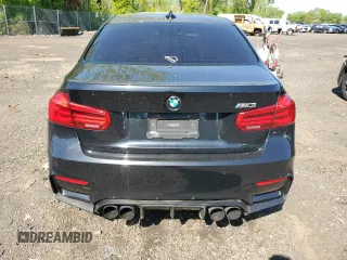2016 BMW M3 z VIN WBS8M9C51G5D31665, wystawiony jako Copart lot #56202635 z przebiegiem 75 785 mil mil oraz Szkody całkowita. Historia ofert i sprzedaży dostępna na DreamBid. Obrazek 6.